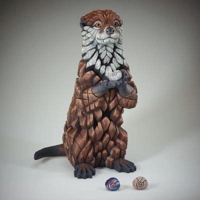Otter Sculpture With Pebbles